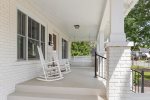 Front Porch with Swing, Rockers, and String Lights